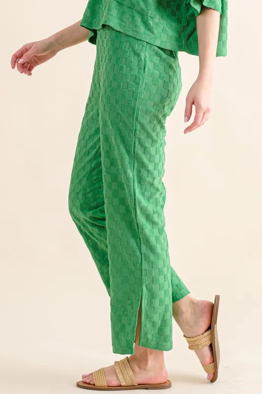 Green textured checkerboard pants with side slit and ruffled top