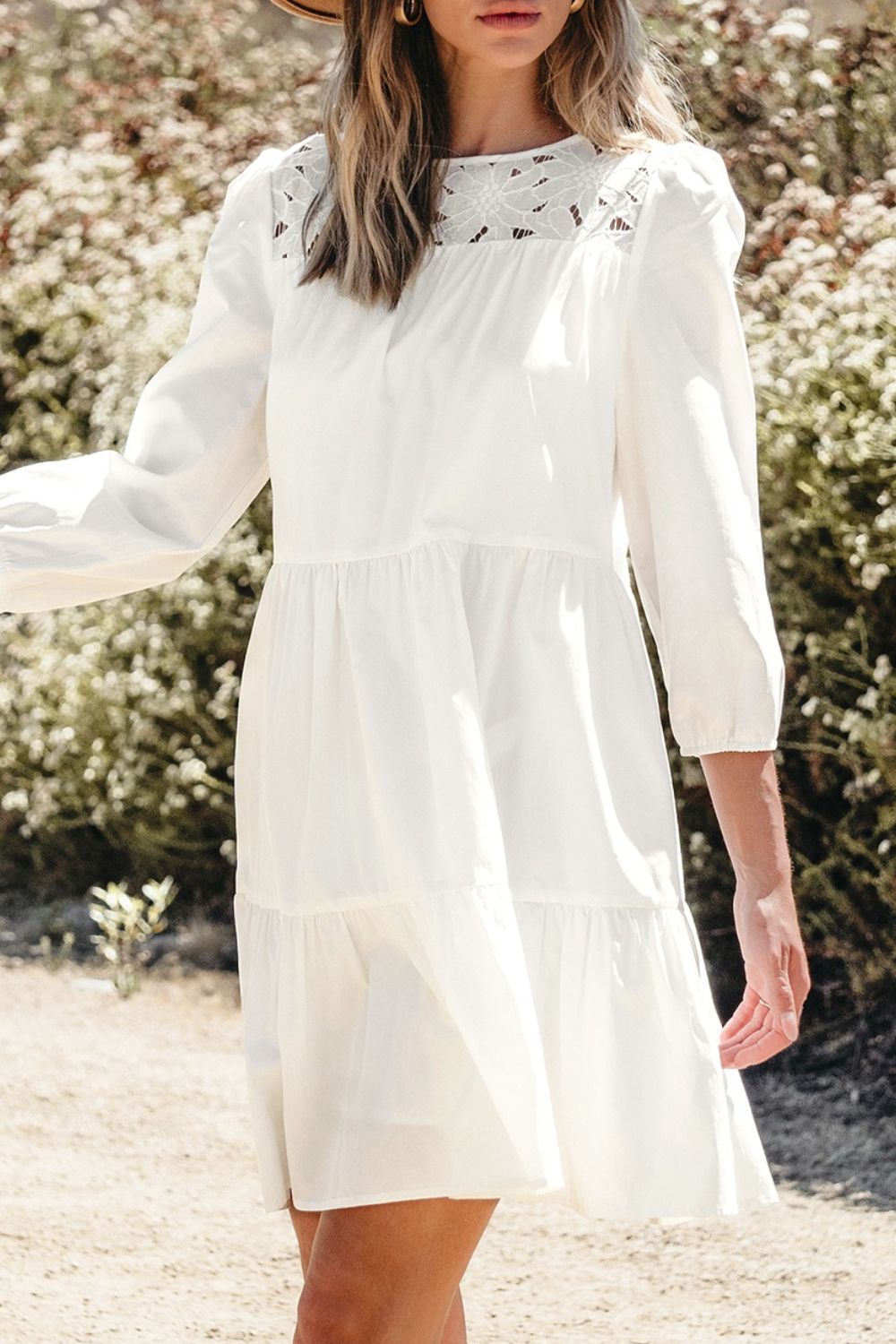 White 3/4 sleeve tiered mini dress with black lace neckline