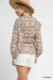 Umgee Floral Smocked Peplum Blouse with Tie Detail | Blouses Daverri Fashions