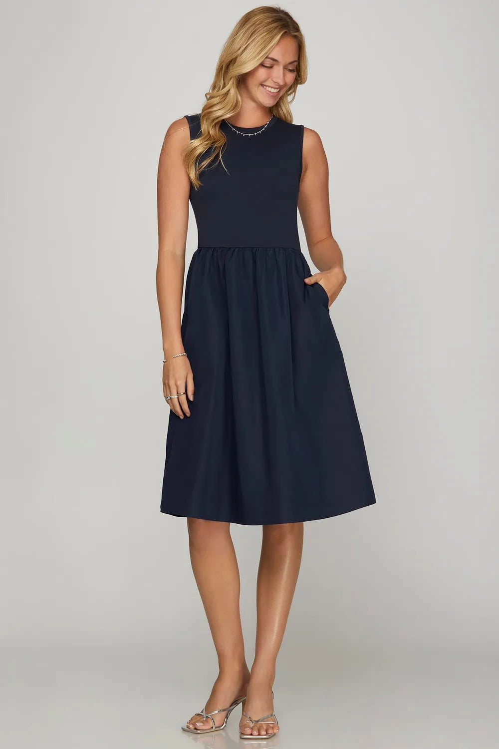 Navy blue sleeveless plus size poplin midi A-line dress with pockets
