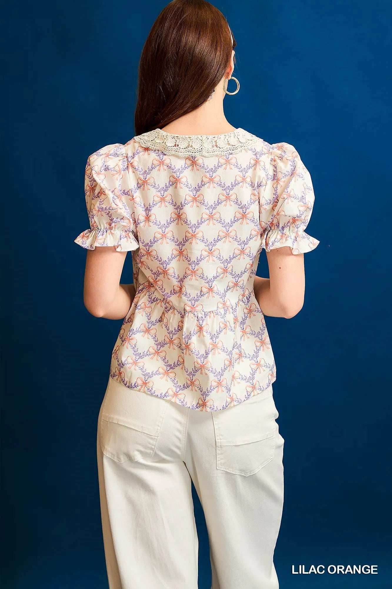 Umgee lilac and orange bow print blouse with ruffled sleeves and lace neckline