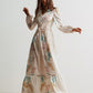 Floral print long sleeve maxi dress with smocked waist and pastel embroidery