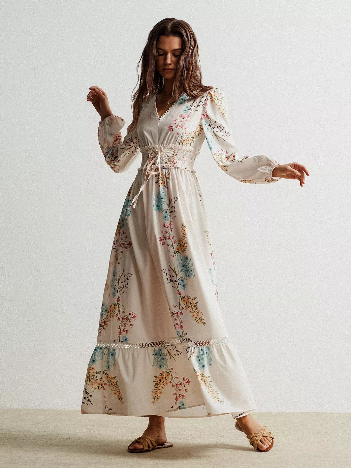 Floral print long sleeve maxi dress with smocked waist and pastel embroidery