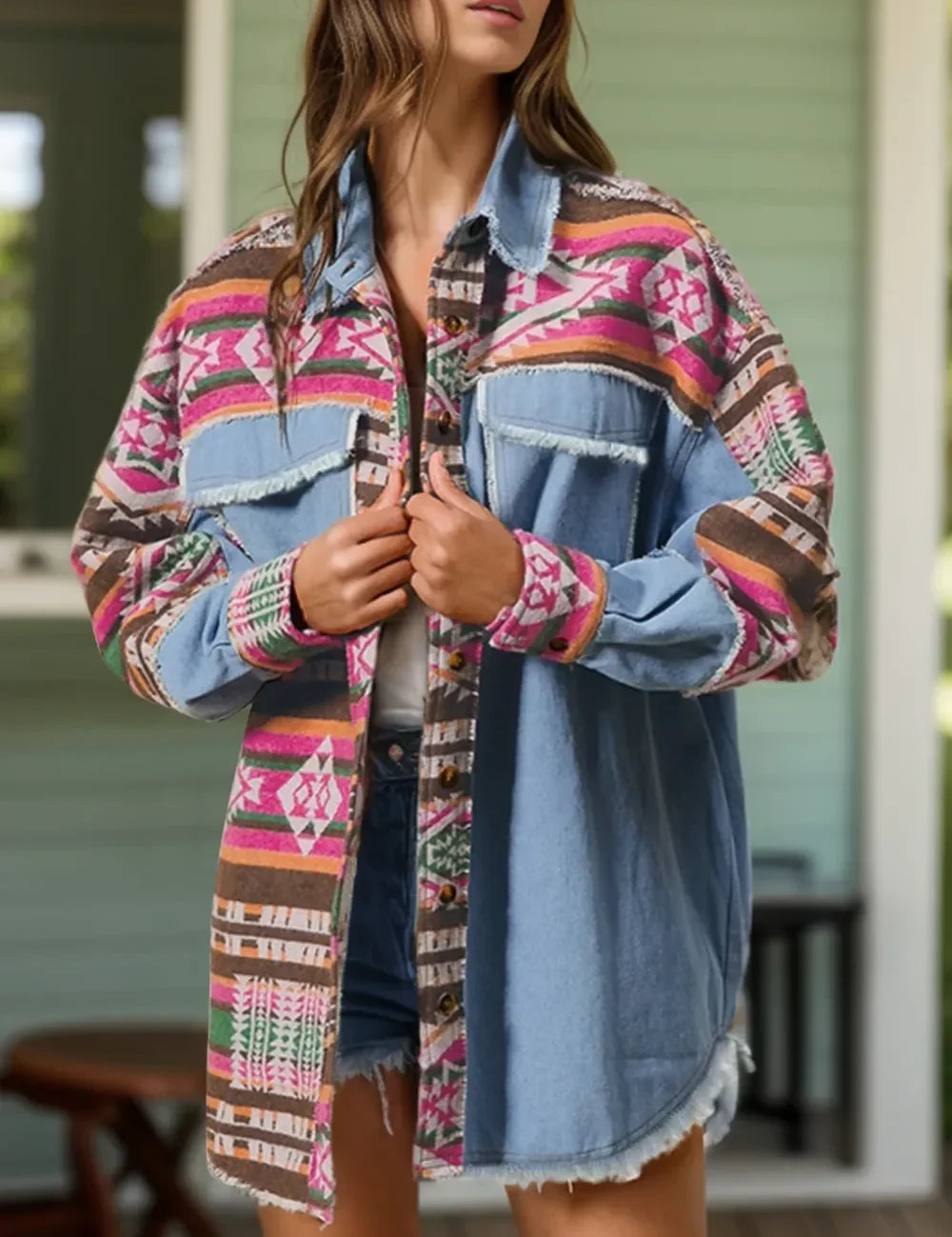 Geometric collared long sleeve shacket in denim with colorful tribal pattern and frayed edges