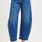 Risen mid-rise crop barrel jeans in blue denim with faded wash and rolled cuffs