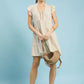 Umgee Linen Tiered Baby Doll Dress in beige with ruffled sleeves and gold embroidery