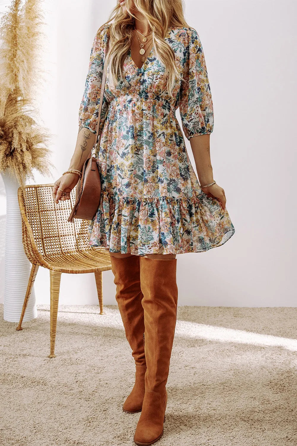 Floral printed V-neck half-sleeve mini dress with ruffled hem and brown suede over-the-knee boots