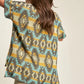 Davi & Dani high-low geometric knit top in teal, mustard, gray