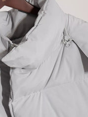 Light gray pocketed zip-up hooded puffer jacket with drawstring hood