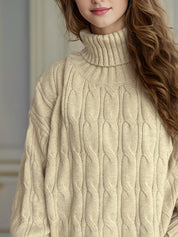 Cream cable-knit turtleneck sweater with ribbed details and long sleeves