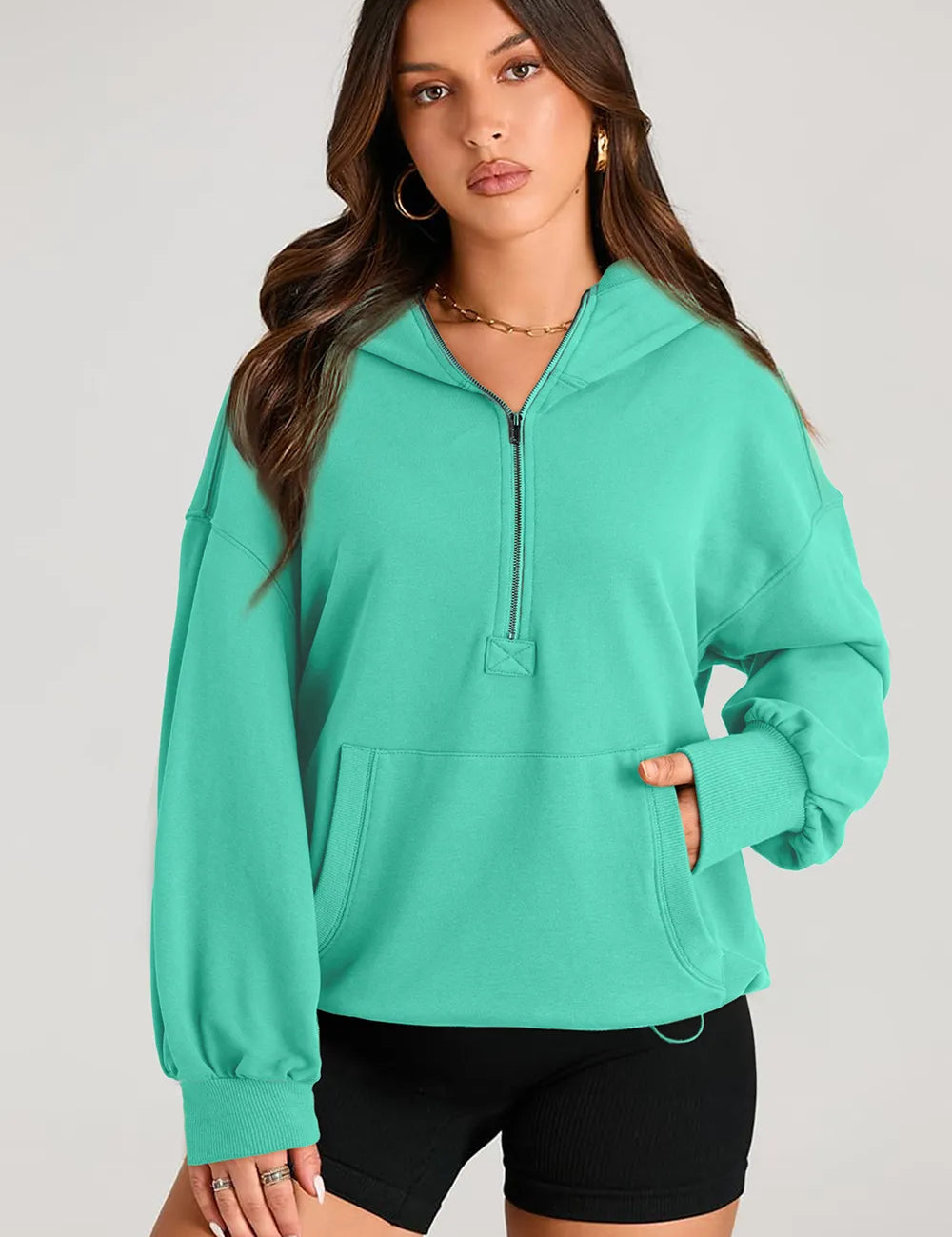 Turquoise Pocketed Half Zip Long Sleeve Hoodie | Hoodies Daverri Fashions