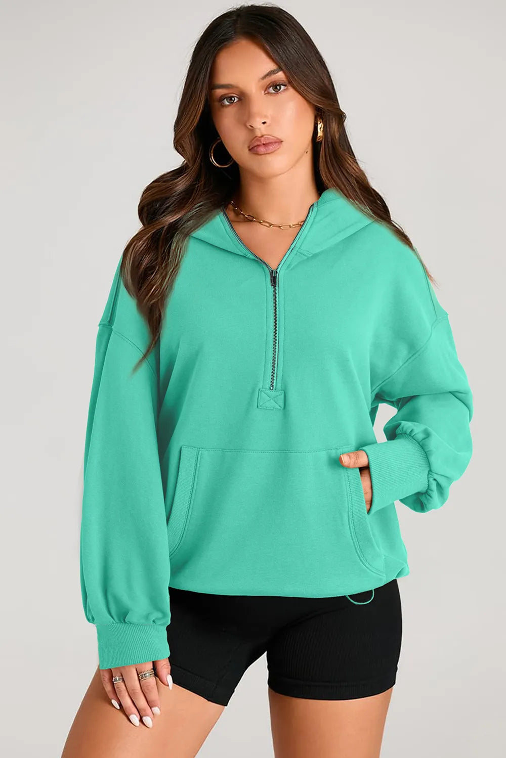Turquoise Pocketed Half Zip Long Sleeve Hoodie | Hoodies Daverri Fashions