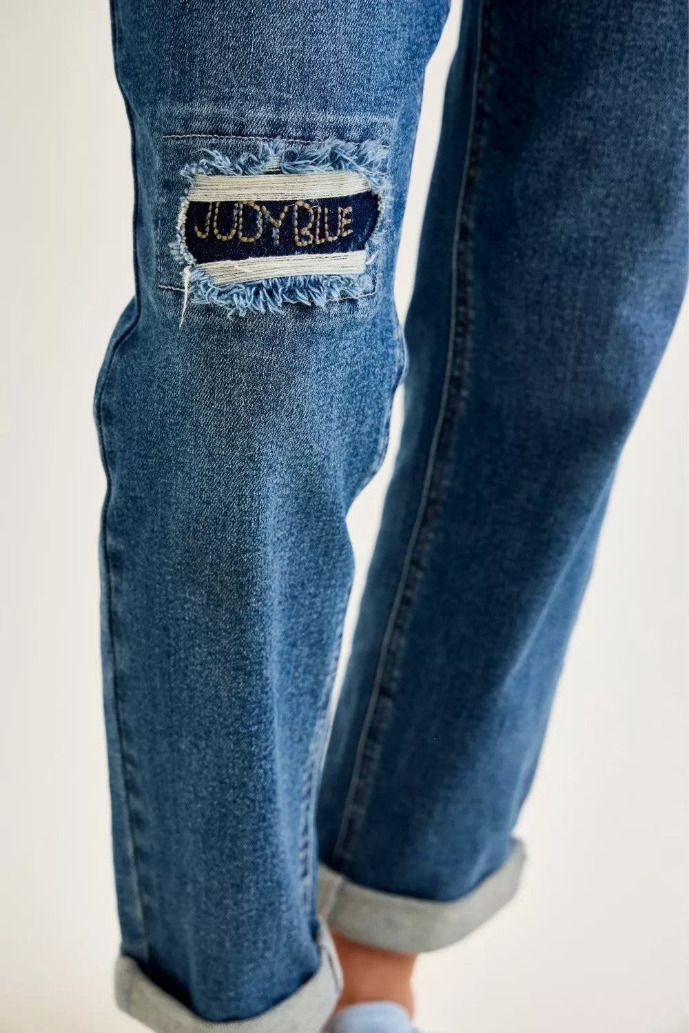 Judy Blue mid-rise boyfriend jeans with embroidered repair patch