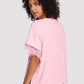 Soft pink loose-fitting round neck short sleeve top with ruffled sleeves