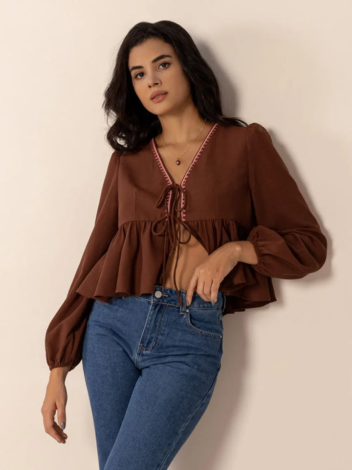 Peplum Tied V-Neck Long Sleeve Blouse | Blouses Daverri Fashions