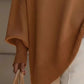 Women’s camel-colored oversized batwing sleeve knit poncho with ribbed cuffs