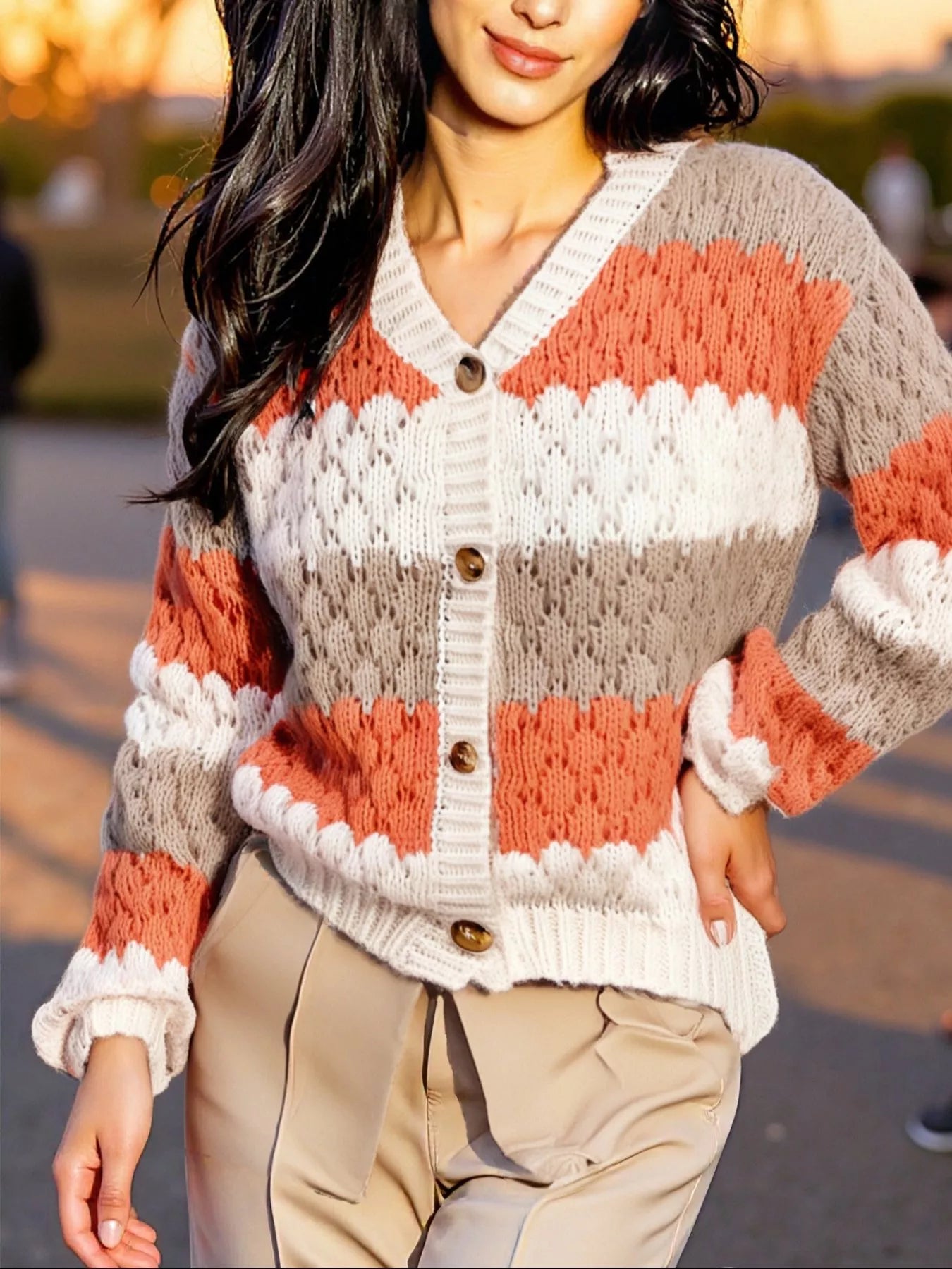 Cozy color block button-up cardigan in striped coral, white, beige