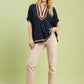 Umgee navy blue linen V-neck blouse with peach trim