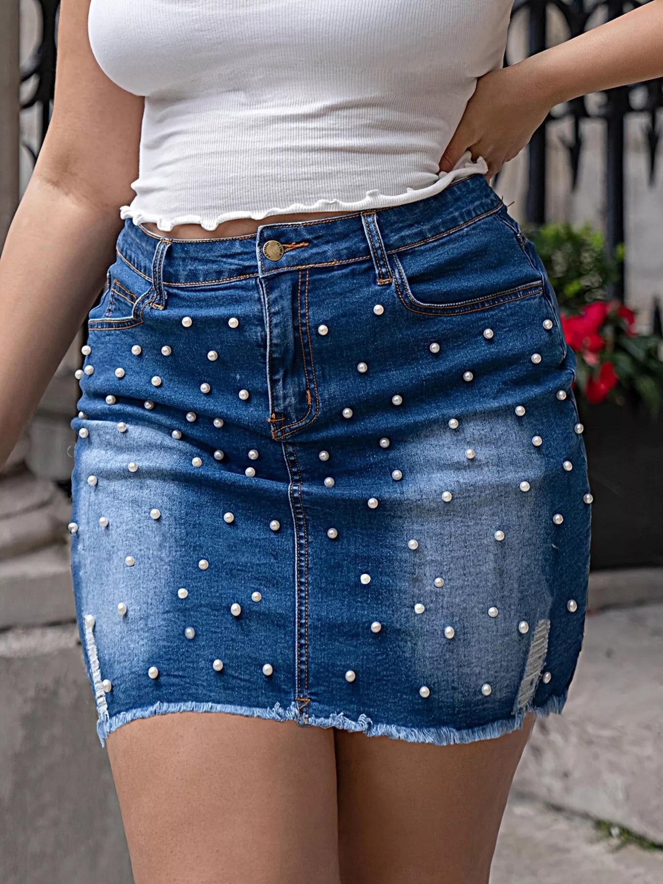 Plus size pearl embellished blue denim mini skirt with frayed hem