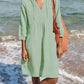 Soft mint green linen V-neck mini dress with drawstring and 3/4 sleeves