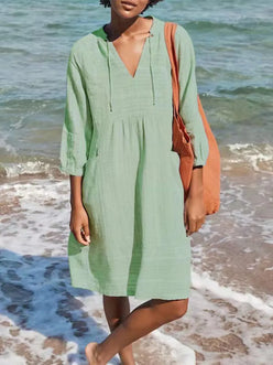 Soft mint green linen V-neck mini dress with drawstring and 3/4 sleeves