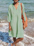 Soft mint green linen V-neck mini dress with drawstring and 3/4 sleeves