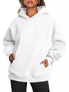 White kangaroo pocket long sleeve hoodie in cozy oversized fabric