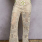 Cream-colored POL openwork crochet flare pants with green star pattern