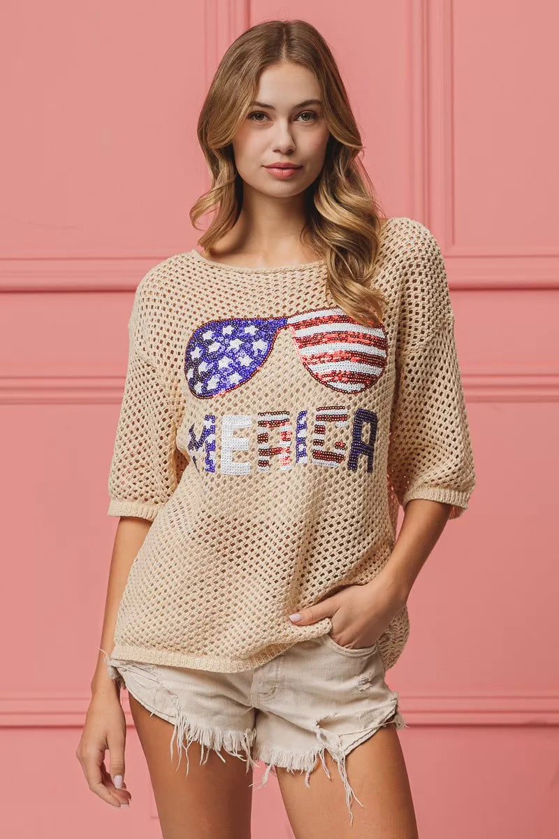 BiBi Sequin American Flag Sunglasses beige knit sweater with America text