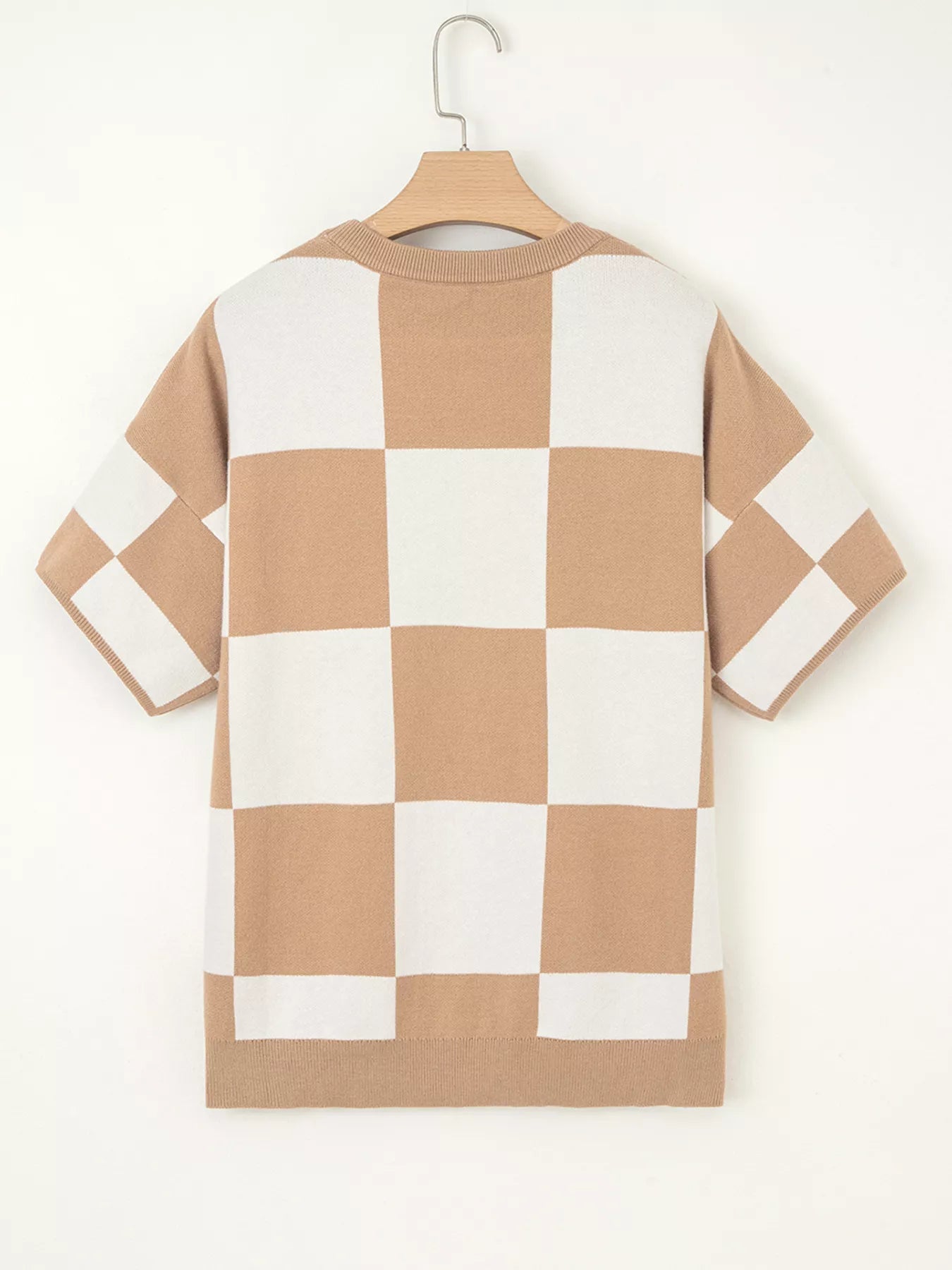 Beige and white checkered loose drop shoulder half sleeve sweater on hanger