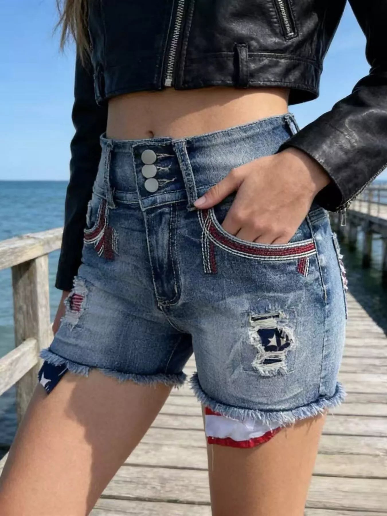 American flag distressed high-waisted denim shorts with frayed hems