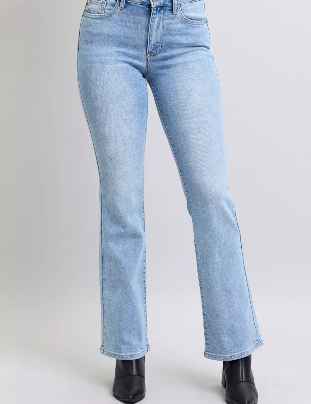 Light blue Judy Blue high-waist bootcut jeans with black ankle boots