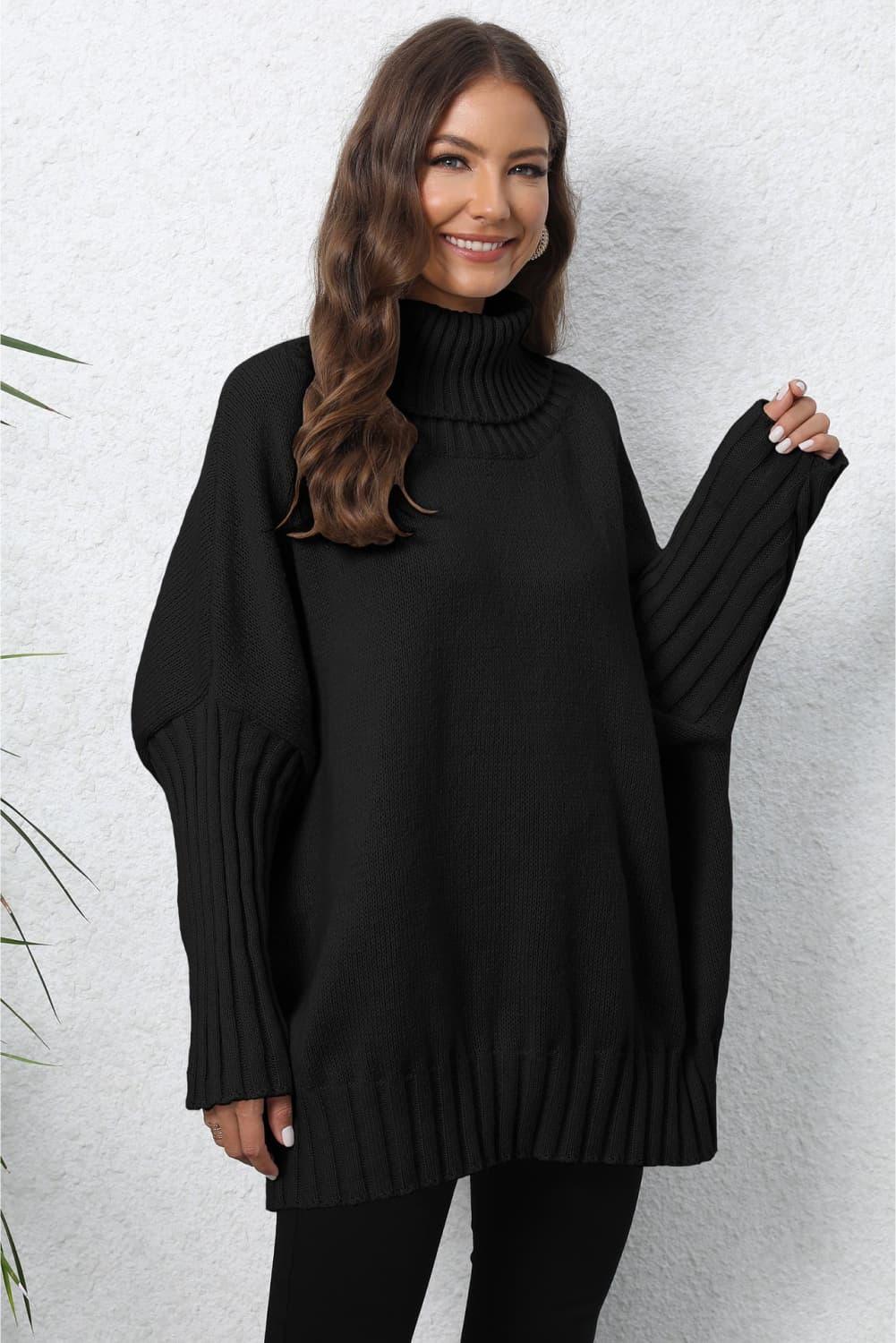 Black oversized turtleneck ribbed sweater in soft knit