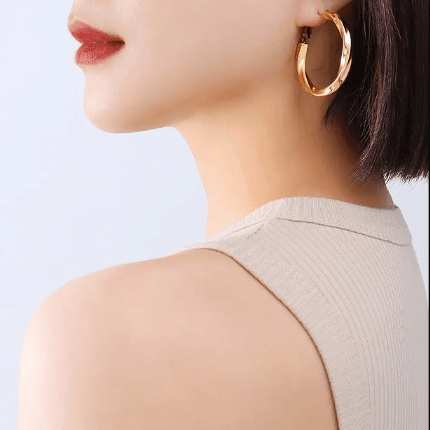 Golden twist hoop earrings Earrings