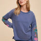 Annie Wear Embroidered Long Sleeve French Terry Top Washed Midnight - DAVERRI FASHIONS