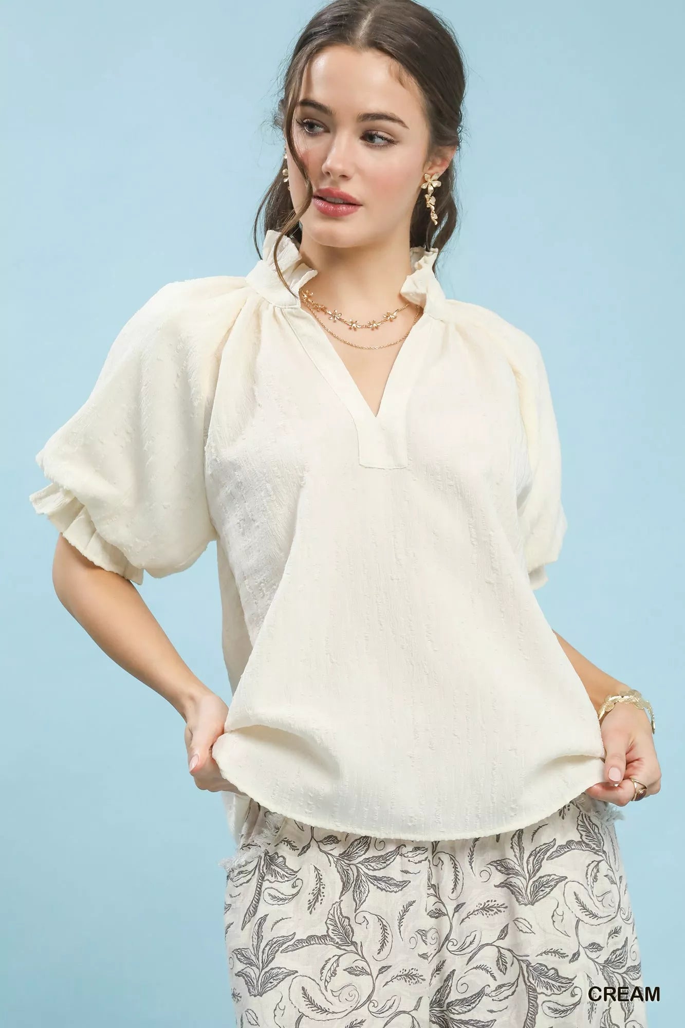 Umgee textured cream puff sleeve split neck top with ruffles