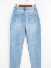 High-rise barrel relaxed light blue distressed denim jeans with patch pockets