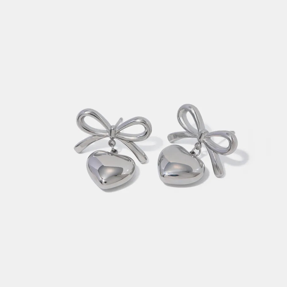 Silver One Size Stainless Steel Bow & Heart Drop Earrings | Earrings Daverri Fashions