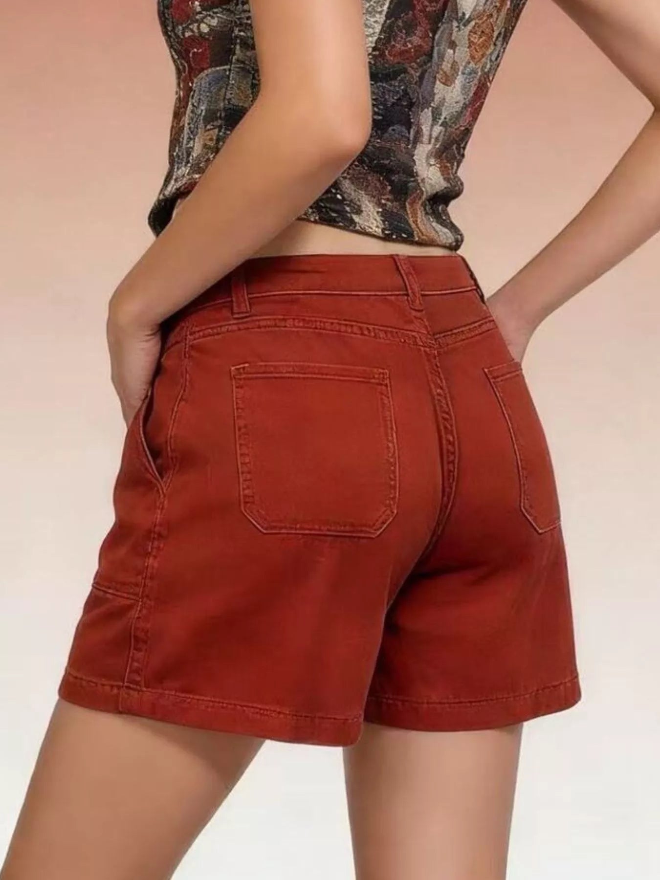 Back view of Daverri Pocketed Denim Shorts in rust color