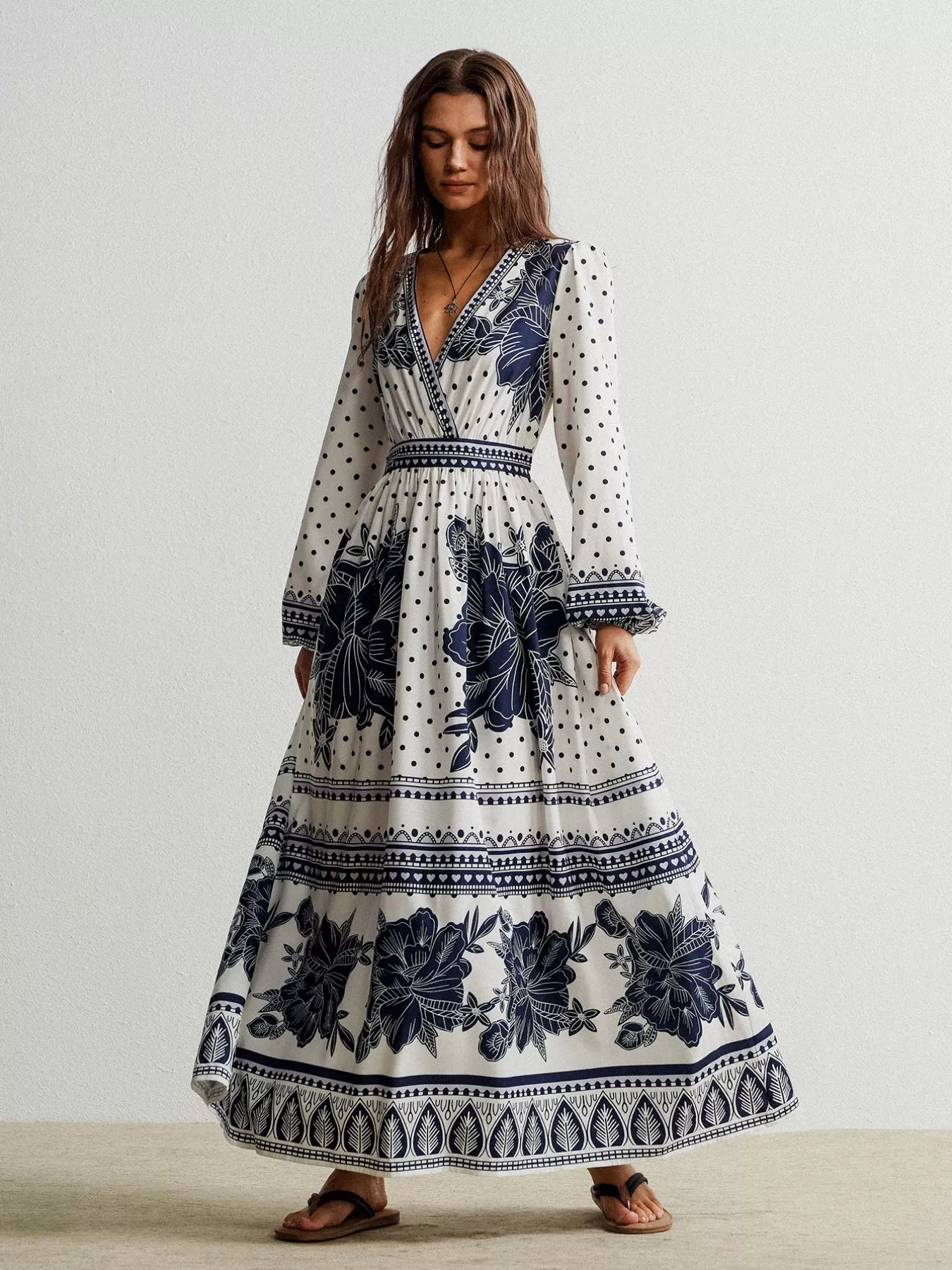 Floral print long sleeve maxi dress with navy blue patterns