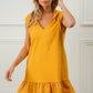 Vibrant yellow sleeveless BiBi ruffled French terry hooded dress with V-neckline and hem
