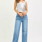 Silver metallic strapless crop top with RISEN Slouchy Straight Jeans