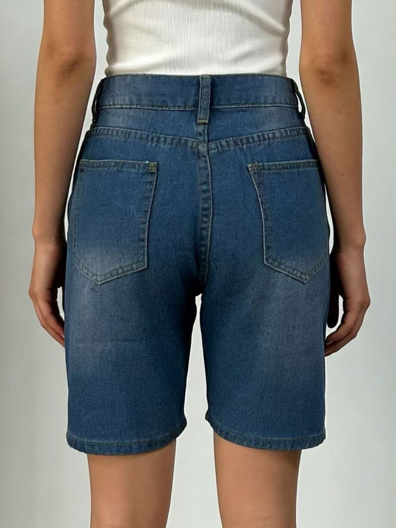 Daverri high-waisted denim shorts in medium blue wash with back pockets