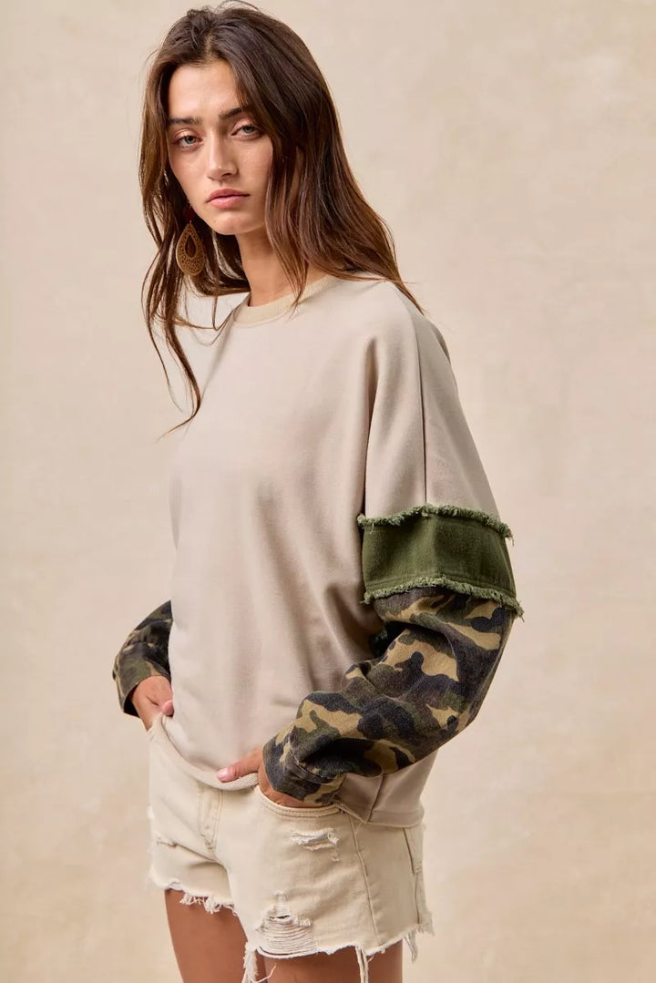 BiBi Camo Sleeve French Terry Top with Frayed Edge | Daverri Fashions