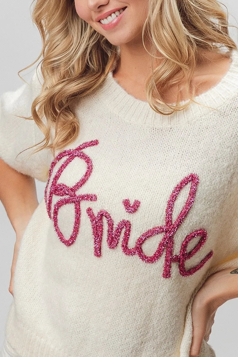 Cream sequined bride sweater with pink accents and puff sleeves
