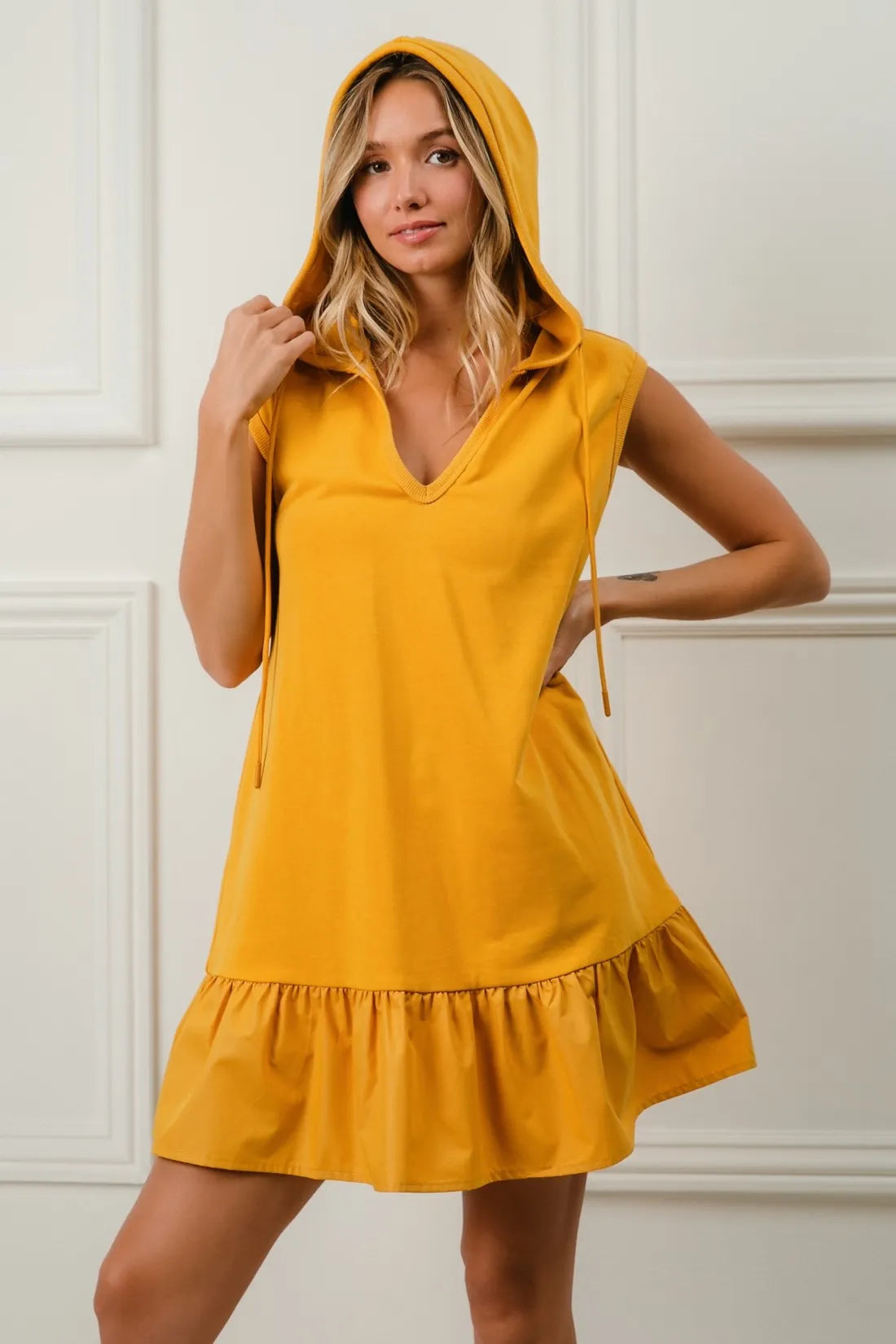 BiBi Ruffled French Terry Hooded Dress in vibrant yellow with ruffled hem