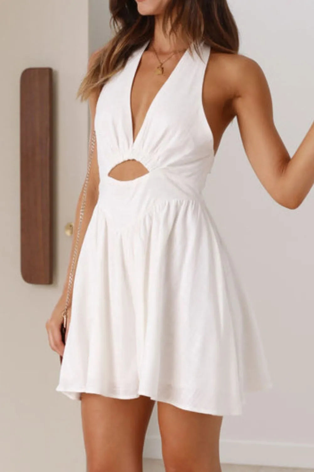 Daverri cutout halter neck mini dress with deep v-cut and waist detail