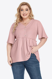 Plus size dusty pink V-neck babydoll blouse with ruffled button front