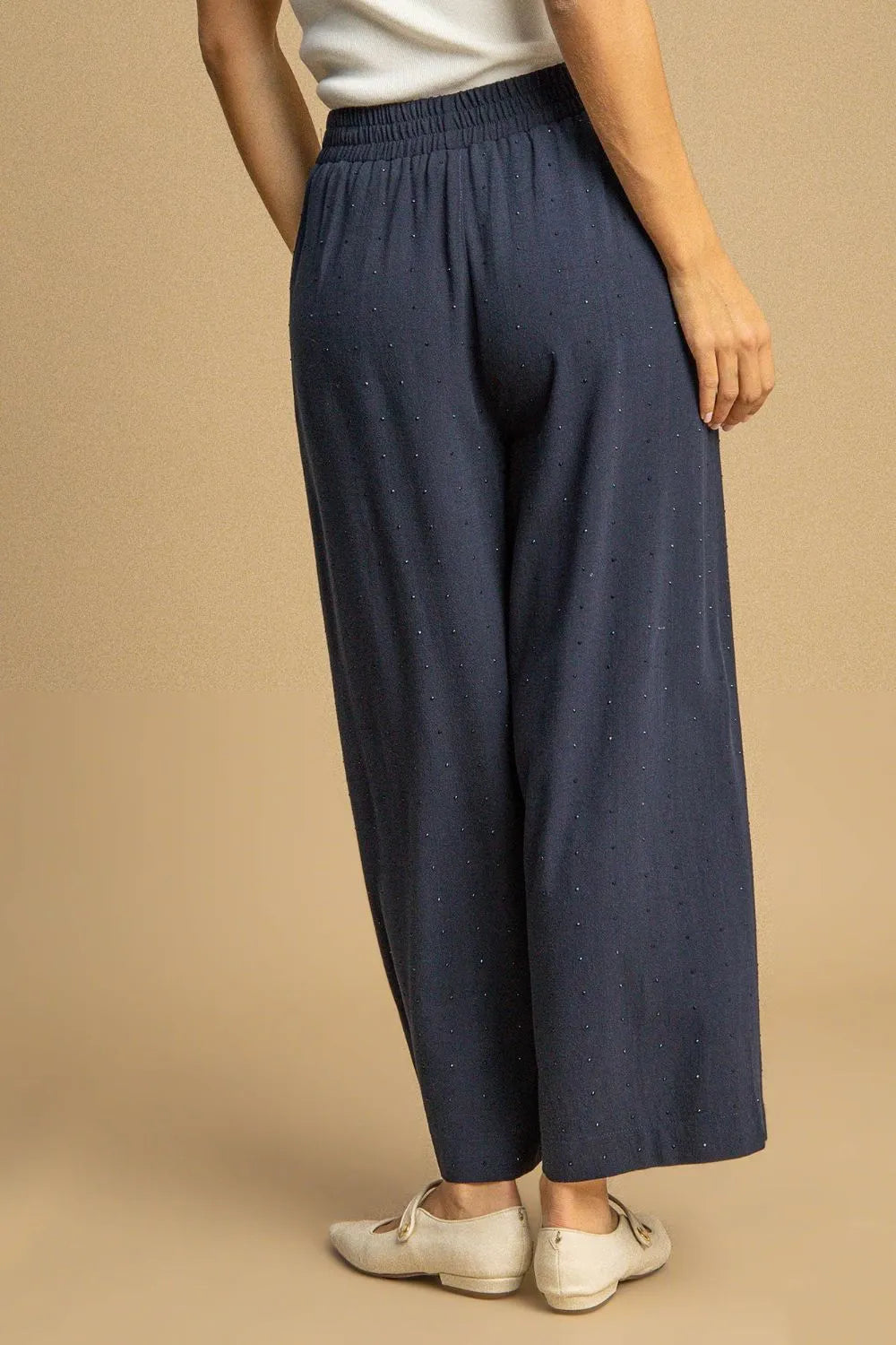 Navy blue wide-leg Umgee linen pants with dotted pattern and elastic waistband
