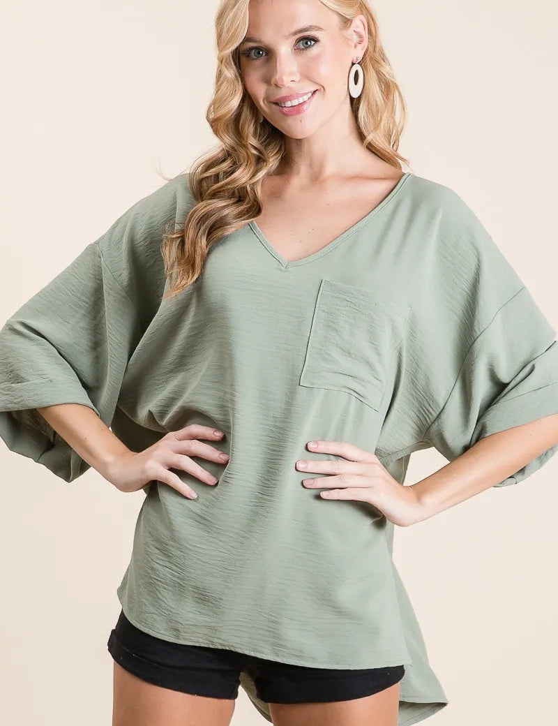 BiBi Flowy Woven V-Neck Top with Rolled Up Cuffs | Tops Daverri Fashions
